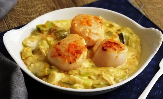Saint-Jacques Fondue de Poireaux à l’Orange: Un Équilibre Subtil entre Terre et Mer