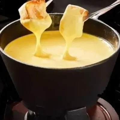 Savourez la Fondue Normande : un délice crémeux