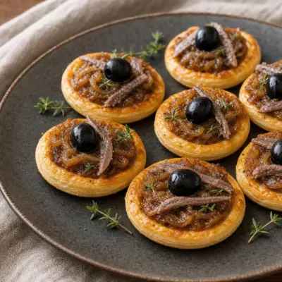 Mini tartelettes aux oignons et aux anchois façon pissaladière