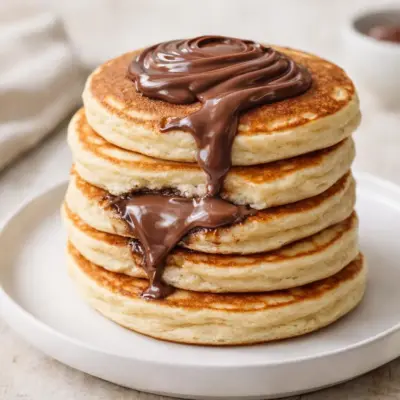 Pancakes moelleux au Nutella, cœur fondant et topping gourmand